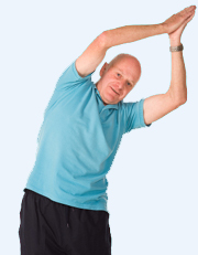 Mature older man doing yoga